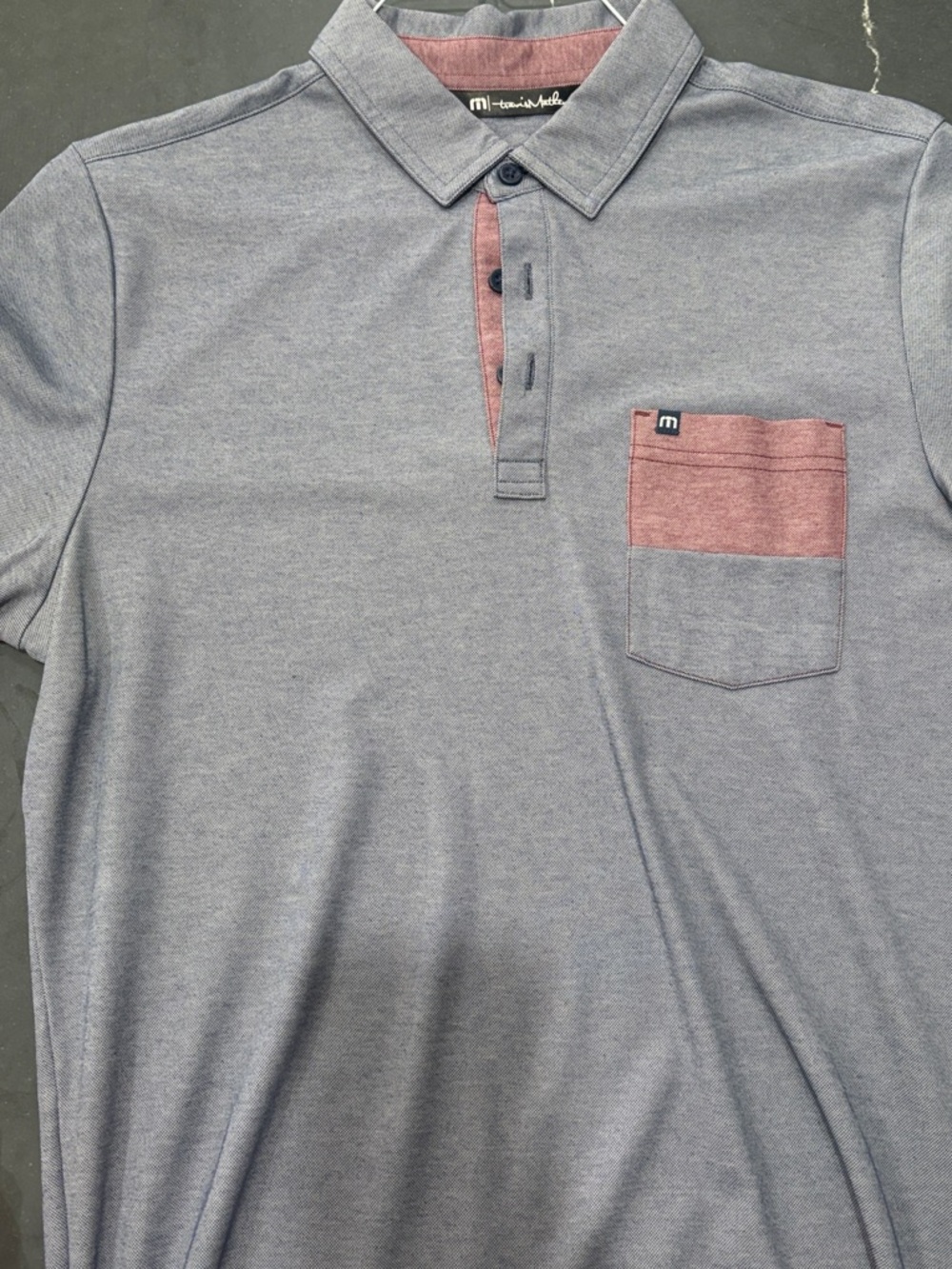 Travis Mathew Heather Blue Polo with Maroon Accent Pocket
